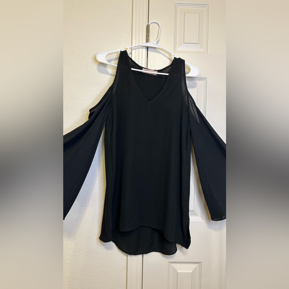 Beautiful flowy off shoulder blouse